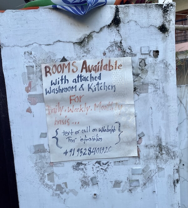 handwritten rooms for rent sign