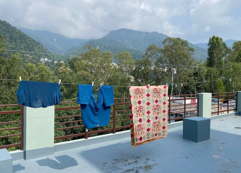 Clothes drying n my rooftop with a view of the hills in the background.